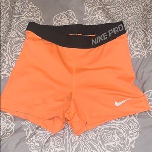 Orange Nike Pro’s